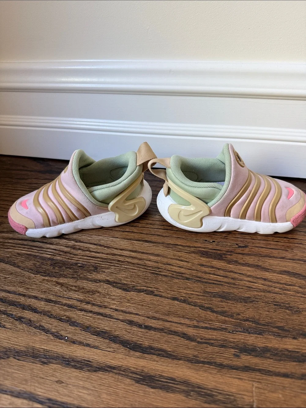 Pink and green Nike dynamo go